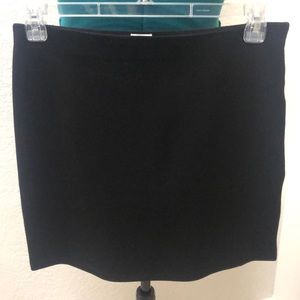 Black stretch mini skirt